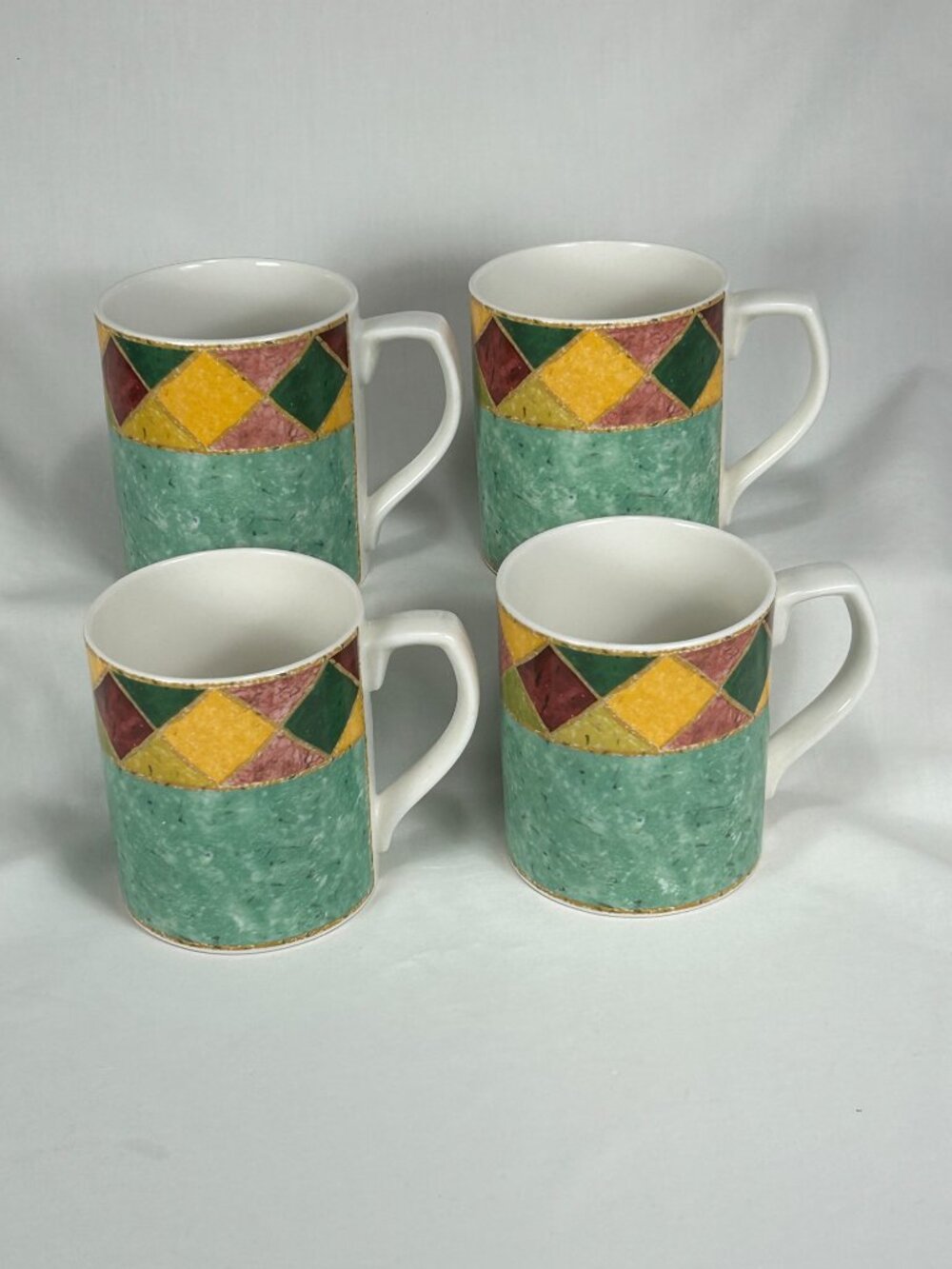 set of 4 colorful coffee mugs. Royal Doulton TC1269 japora